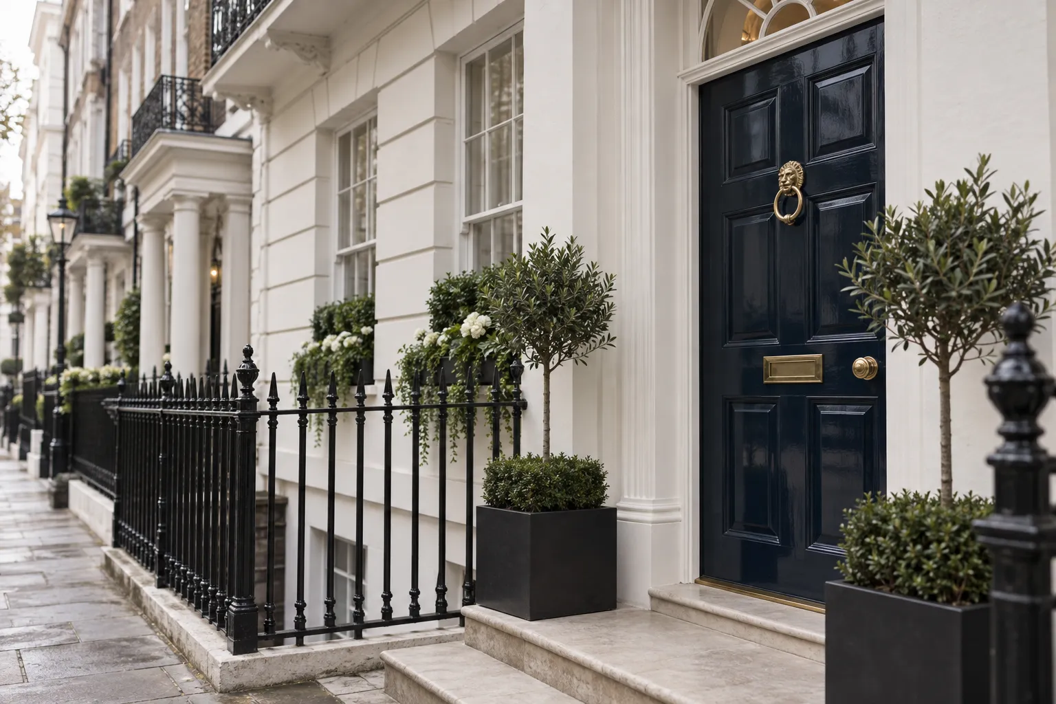 A Georgian townhouse with a navy front door